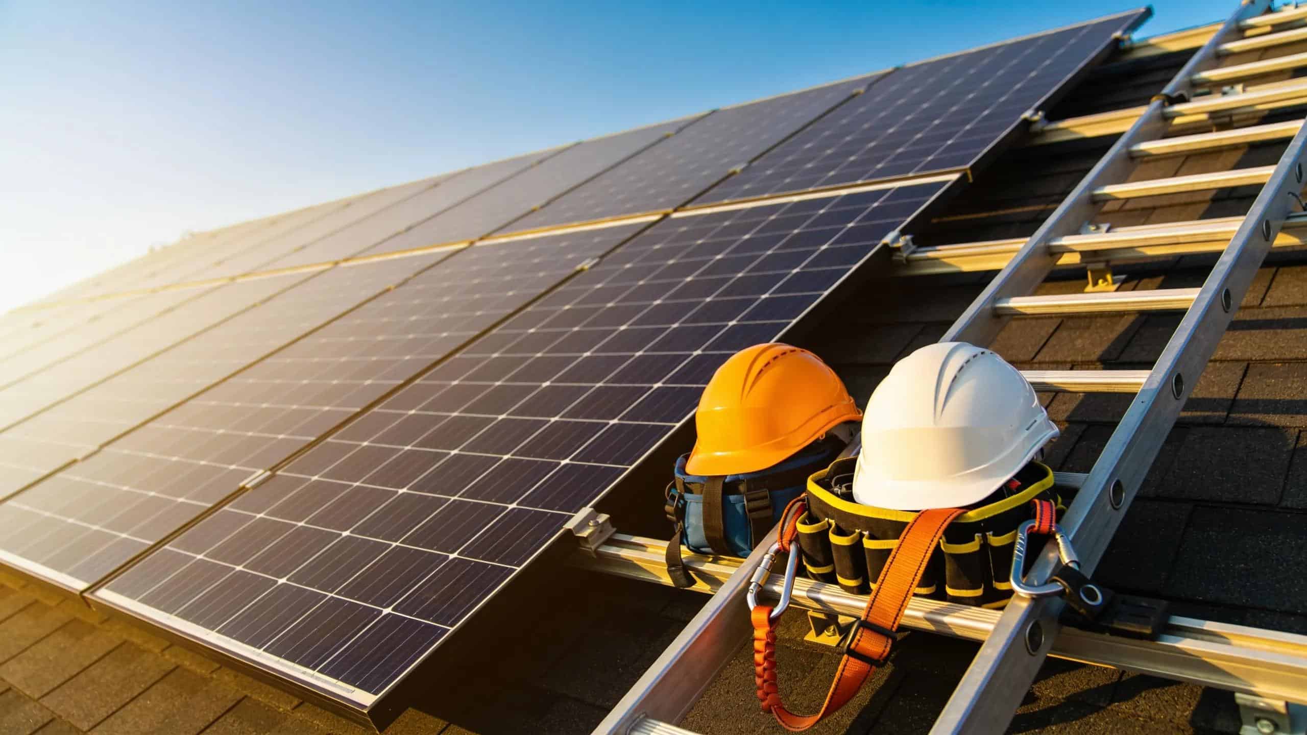High-quality solar panels on a rooftop with installation tools, representing materials and labor for solar installation